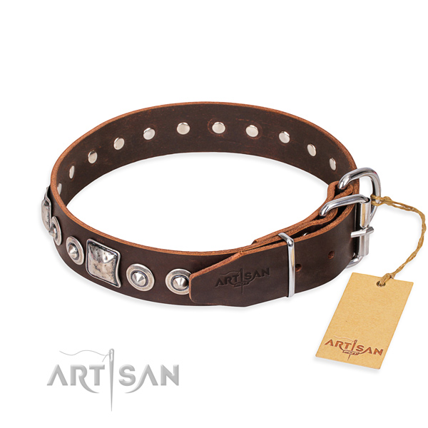 Full grain leather dog collar made of gentle to touch material with reliable studs