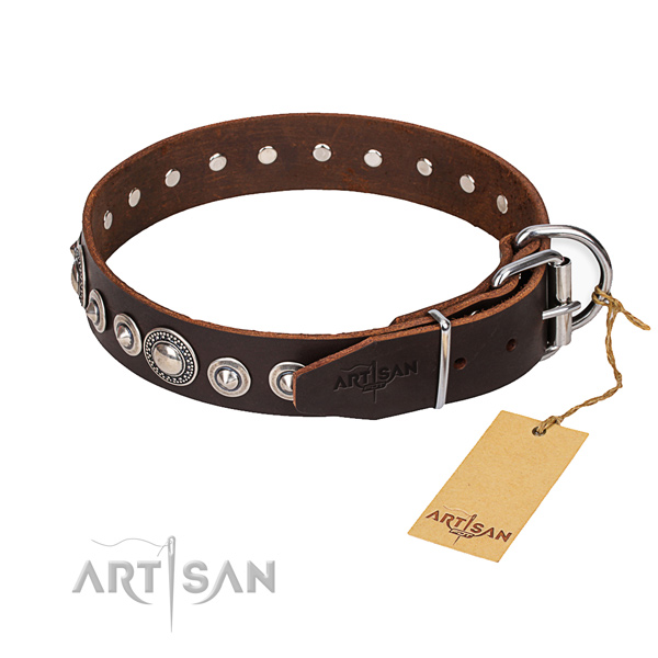 Natural genuine leather dog collar made of soft to touch material with corrosion proof hardware